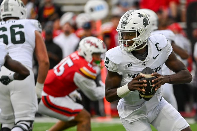 Sep 7, 2024; College Park, Maryland, USA; Michigan State Spartans quarterback Aidan Chiles (2) rolls out to pass during the first quarter against the Maryland Terrapins at SECU Stadium. Mandatory Credit: Tommy Gilligan-Imagn Images