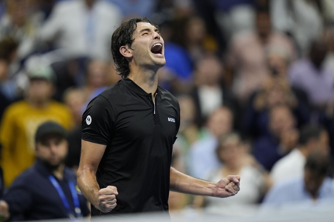 Taylor Fritz of the U.S reacts after defeating Frances Tiafoe during the men's singles semifinals of the U.S. Open tennis championships on Friday in New York.