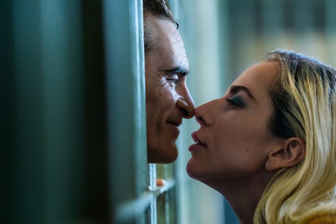 Arthur Fleck (Joaquin Phoenix) and Lee Quinzel (Lady Gaga) share a bad romance in "Joker: Folie à Deux."