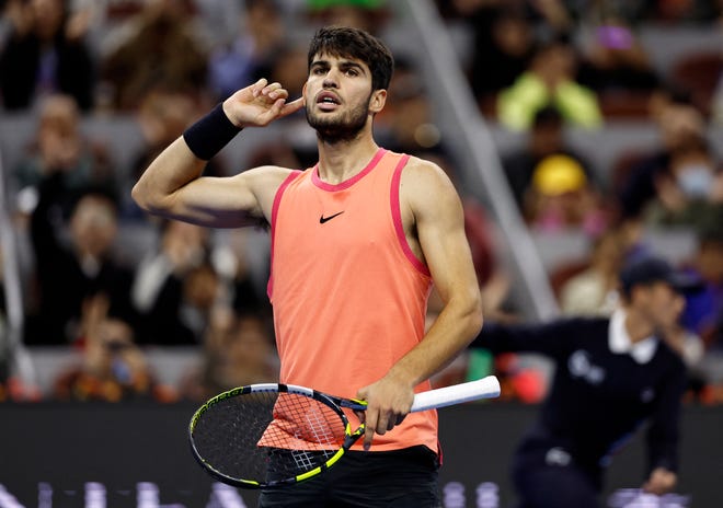 Spain's Carlos Alcaraz reacts during his China Open final victory against Italy's Jannik.