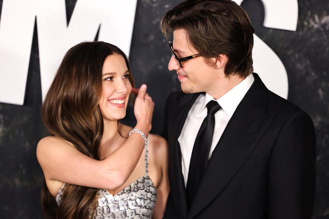 Millie Bobby Brown and Jake Bongiovi attend the premiere of the Netflix film "Damsel" at the Paris Theater in New York City on March 1, 2024.