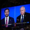 As seen on a monitor in the studio Republican vice presidential nominee Sen. JD Vance, R-Ohio, and Democratic vice presidential candidate Minnesota Gov. Tim Walz participate during a vice presidential debate hosted by CBS News, Tuesday, Oct. 1, 2024, in New York.