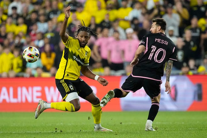 Oct 2, 2024; Columbus, OH, USA; Columbus Crew defender Steven Moreira (31) chases down a ball beside Inter Miami CF forward Lionel Messi (10) during the second half of the MLS soccer game at Lower.com Field. Miami won 3-2.