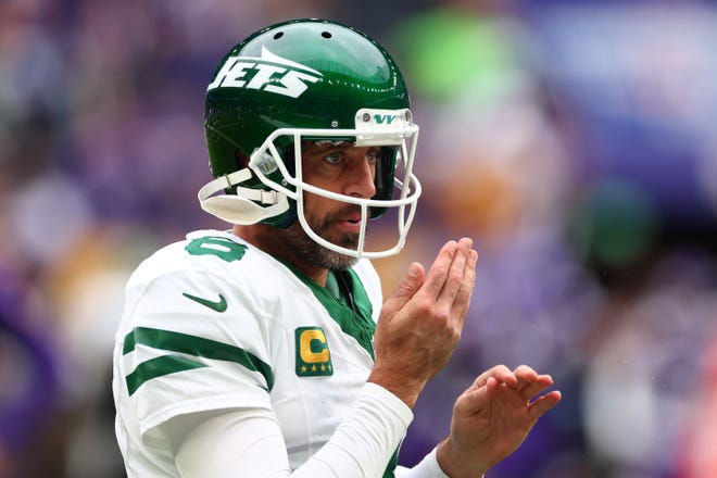 Oct 6, 2024; Tottenham, ENG; New York Jets Quarterback Aaron Rodgers (8) during the warm up before kick off against Minnesota Vikings at Tottenham Hotspur Stadium. Mandatory Credit: Shaun Brooks-Imagn Images