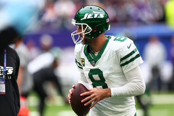 Oct 6, 2024; Tottenham, ENG; New York Jets Quarterback Aaron Rodgers (8) during the warm up before kick off against Minnesota Vikings at Tottenham Hotspur Stadium. Mandatory Credit: Shaun Brooks-Imagn Images