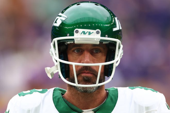 Oct 6, 2024; Tottenham, ENG; New York Jets Quarterback Aaron Rodgers (8) during the warm up before kick off against Minnesota Vikings at Tottenham Hotspur Stadium. Mandatory Credit: Shaun Brooks-Imagn Images