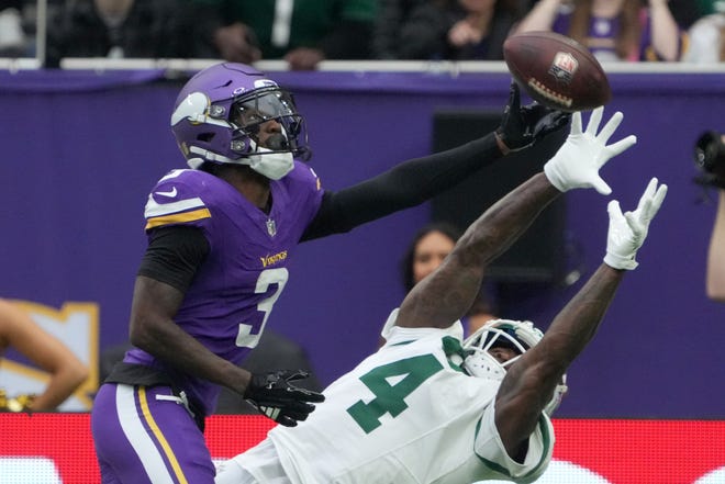 Oct 6, 2024; London, United Kingdom; New York Jets cornerback D.J. Reed (4) defends against Minnesota Vikings wide receiver Jordan Addison (3) in the first half at Tottenham Hotspur Stadium. Mandatory Credit: Kirby Lee-Imagn Images