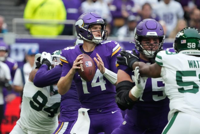 Oct 6, 2024; London, United Kingdom; Minnesota Vikings quarterback Sam Darnold (14) throws the ball against the New York Jets in the first half at Tottenham Hotspur Stadium. Mandatory Credit: Kirby Lee-Imagn Images