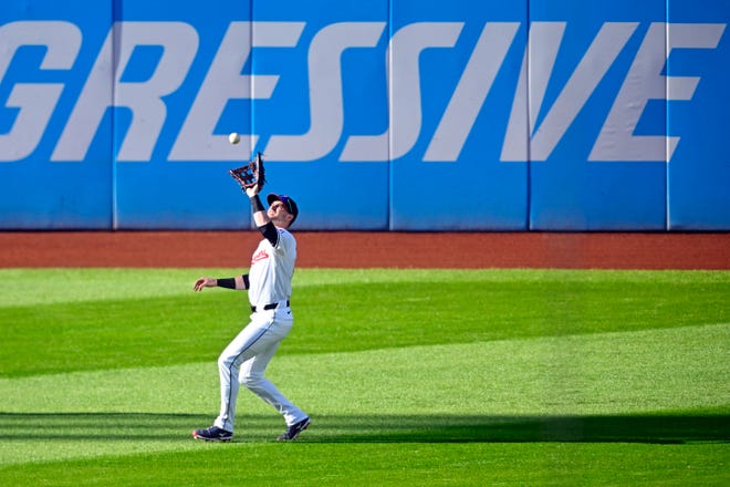 Guardians outfielder Lane Thomas catches a fly ball in the first inning against the Tigers in Game 2 of the ALDS, Oct.. 7, 2024, in Cleveland.