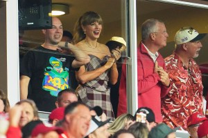 Taylor Swift arrives prior to a game between the Kansas City Chiefs and the New Orleans Saints on Oct. 7 in Kansas City, Missouri, sparkly freckles, tartan, corset, kilt, Vivienne Westwood