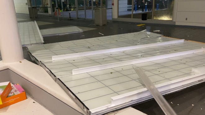 Hours after Hurricane Milton made landfall near Siesta Key, Florida, the storm's winds caused a 30-foot piece of skylight to fall from the roof of the Melbourne Orlando International Airport (across the state) at 2 a.m. Thursday, Oct. 10, 2024. Shown are the 30-by-40 feet piece of roof that fell and unopened inflatable pools. The airport's executive director Greg Donovan said a first responder jokingly brought them, noting a perfect space for them near the hole.