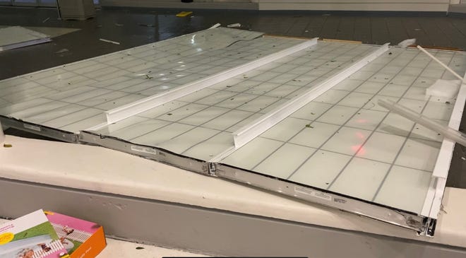 Hours after Hurricane Milton made landfall near Siesta Key, Florida, the storm's winds caused a 30-foot piece of skylight to fall from the roof of the Melbourne Orlando International Airport (across the state) at 2 a.m. Thursday, Oct. 10, 2024. Shown are the 30-by-40 feet piece of roof that fell and unopened inflatable pools. The airport's executive director Greg Donovan said a first responder jokingly brought them, noting a perfect space for them near the hole.