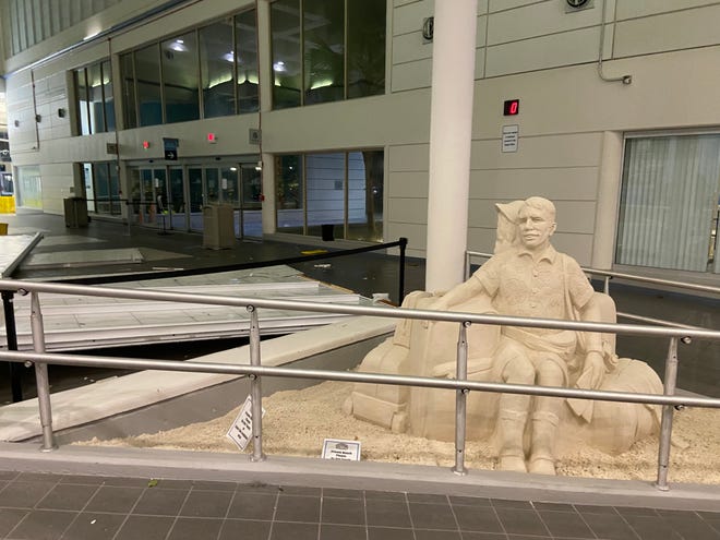 Three Sandsational sand sculptures at Melbourne Orlando International Airport avoided damage from Hurricane Milton. The storm's winds caused a 30-foot piece of skylight to fall from the roof about 2 a.m. Thursday, Oct. 10, 2024. Greg Donovan, executive director of Melbourne Orlando International Airport, said a NASCAR vehicle on display also avoided a direct hit from the busted skylight nearby.