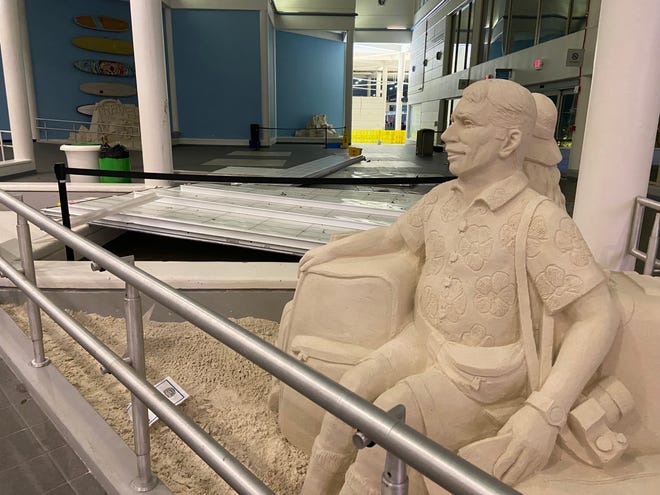 Three Sandsational sand sculptures at Melbourne Orlando International Airport avoided damage from Hurricane Milton. The storm's winds caused a 30-foot piece of skylight to fall from the roof about 2 a.m. Thursday, Oct. 10, 2024. Greg Donovan, executive director of Melbourne Orlando International Airport, said a NASCAR vehicle on display also avoided a direct hit from the busted skylight nearby.