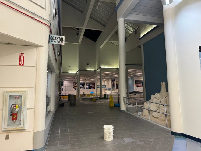 Hours after Hurricane Milton made landfall near Siesta Key, Florida, the storm's winds caused a 30-foot piece of skylight to fall from the roof of the Melbourne Orlando International Airport (across the state) at 2 a.m. Thursday, Oct. 10, 2024. The hole in the roof was 30-by-40 feet and can be seen in the background, according to Greg Donovan, executive director of Melbourne Orlando International Airport.