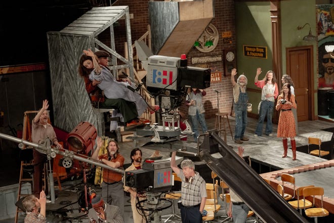 Gilda Radner (Ella Hunt, top) waves to the rest of the Saturday Night Live cast and crew as the first episode gets set to air in "Saturday Night."