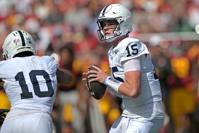 Oct 12, 2024; Los Angeles, California, USA; Penn State Nittany Lions quarterback Drew Allar (15) throws a pass in the first half against the USC Trojans at United Airlines Field at the Los Angeles Memorial Coliseum. Mandatory Credit: Jayne Kamin-Oncea-Imagn Images