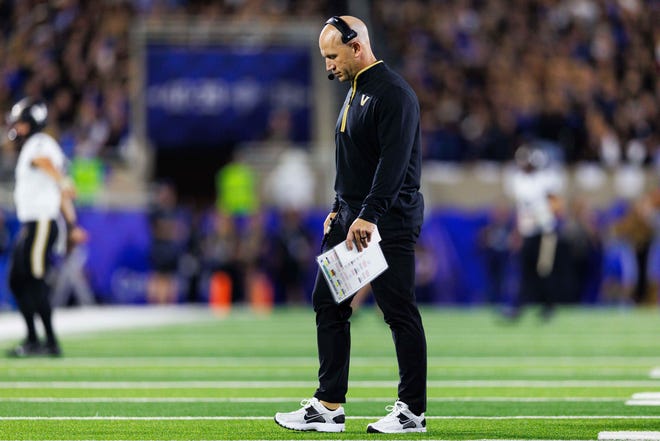 Oct 12, 2024; Lexington, Kentucky, USA; Vanderbilt Commodores head coach Clark Lea walks to the sideline during the first quarter against the Kentucky Wildcats at Kroger Field. Mandatory Credit: Jordan Prather-Imagn Images