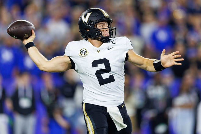 Oct 12, 2024; Lexington, Kentucky, USA; Vanderbilt Commodores quarterback Diego Pavia (2) throws a pass against the Kentucky Wildcats during the first quarter at Kroger Field. Mandatory Credit: Jordan Prather-Imagn Images