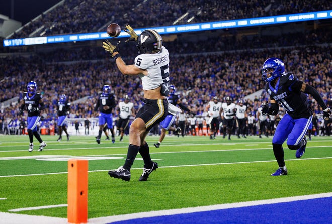 Oct 12, 2024; Lexington, Kentucky, USA; Vanderbilt Commodores wide receiver Richie Hoskins (5) catches a pass and dives into the end zone for a touchdown against the Kentucky Wildcats during the second quarter at Kroger Field. Mandatory Credit: Jordan Prather-Imagn Images