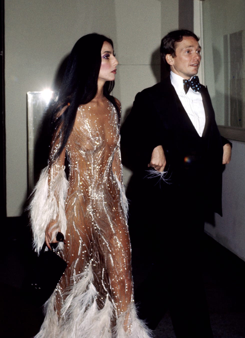 cher wearing the famous "naked dress" with bob mackie at the 1974 met gala