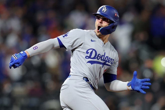 Los Angeles Dodgers third baseman Enrique Hernandez (8) reacts after hitting a two run home run against the New York Mets in the sixth inning during Game 3 of the NLCS for the 2024 MLB playoffs on Oct. 16, 2024, at Citi Field.