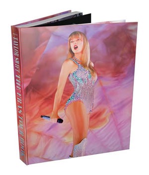 Taylor Swift will release "Taylor Swift - The Eras Tour Book," a collection of more than 500 photos from her record-breaking tour, Nov. 29 exclusively at Target.