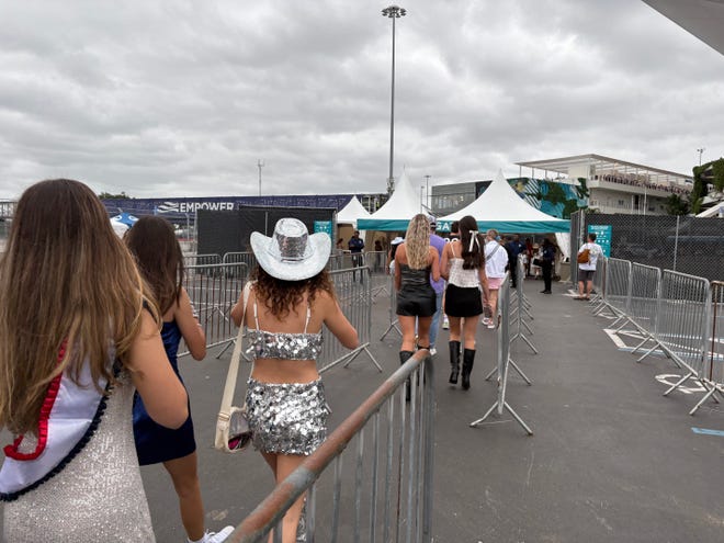 Taylor Swift fans arrive at Hard Rock Stadium in Miami Gardens for Night 1 of the Eras Tour's return to North America.