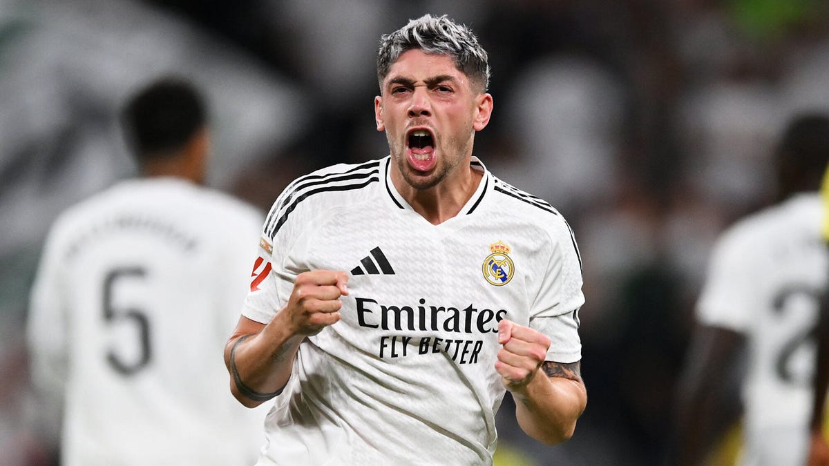 Federico Valverde of Real Madrid celebrating, shouting, with both fists clenched.