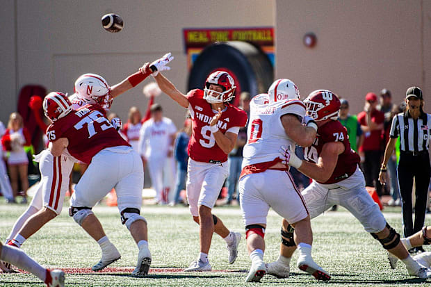 Indiana's Kurtis Rourke (9) passes during the Indiana versus Nebraska football game at Memorial Stadium.