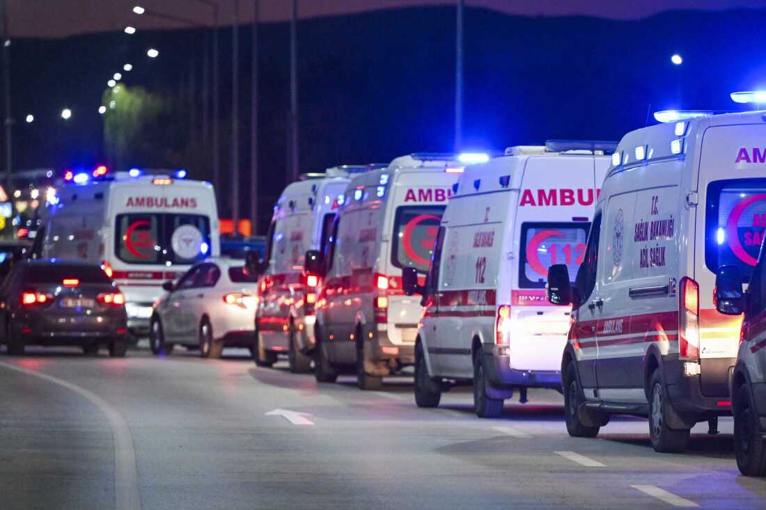 Ambulances wait in line outside of Turkish Aerospace Industries Inc. at the outskirts of Ankara, Turkey, Wednesday.