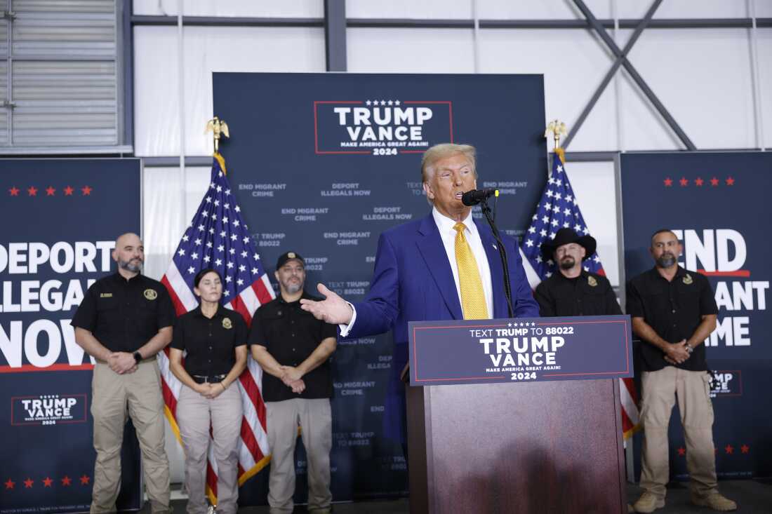 Former President Donald Trump gives remarks on border security inside an airplane hanger at the Austin-Bergstrom International Airport in Austin, Texas, on Friday.