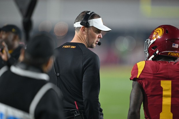 USC head coach Lincoln Riley looks on during the first...