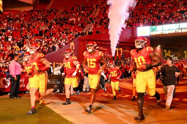 USC players take the field before their game against Rutgers...