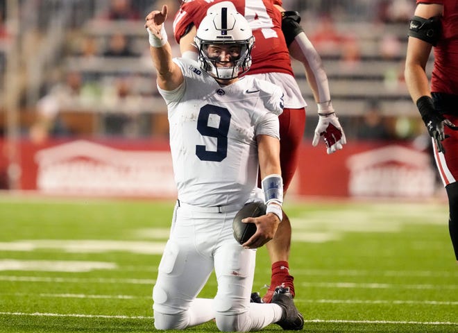 Penn State quarterback Beau Pribula (9) celebrates after earning a first down during the fourth quarter Wisconsin at Camp Randall Stadium.