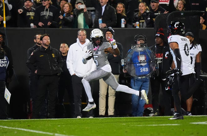 Jimmy Horn Jr. (5) had a Colorado touchdown called back when he signaled a peace sign to UC defensive back Josh Minkins Jr.