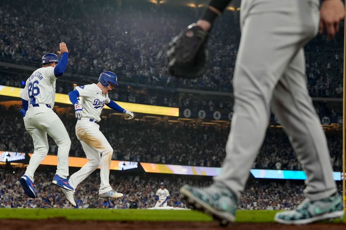 Freeman celebrates his walk-off grand slam against the Yankees in Game 1 of the World Series.