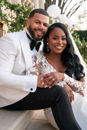 Tyler Francis and Ashley Adionser are seen at their wedding in Season 7, Episode 12, of "Love is Blind."