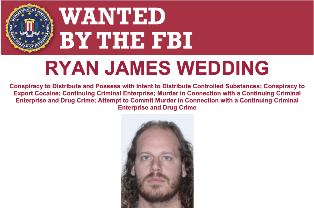 Ryan Wedding appears on an FBI wanted poster. The U.S. says Wedding, 43, is a fugitive and may be in Mexico.