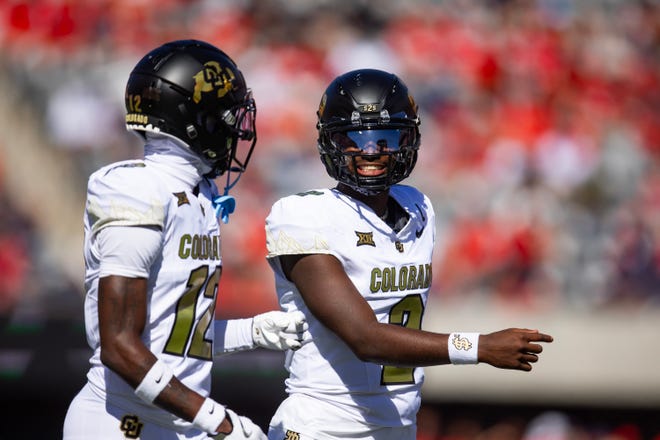 Shedeur Sanders (2) and Travis Hunter (12) are a lethal connection for Colorado. The Buffaloes host the Cincinnati Bearcats Saturday night.