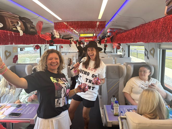 Taylor Swift fans on Brightline's Orlando to Miami Swift Sing-Along train Friday.