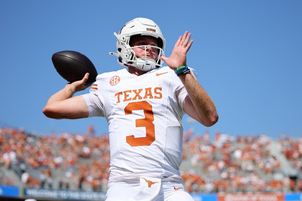 DALLAS, TEXAS - OCTOBER 12: Quinn Ewers #3 of the Texas Longhorns warms up prior to a game against the Oklahoma Sooners at Cotton Bowl Stadium on October 12, 2024 in Dallas, Texas. (Photo by Alex Slitz/Getty Images)