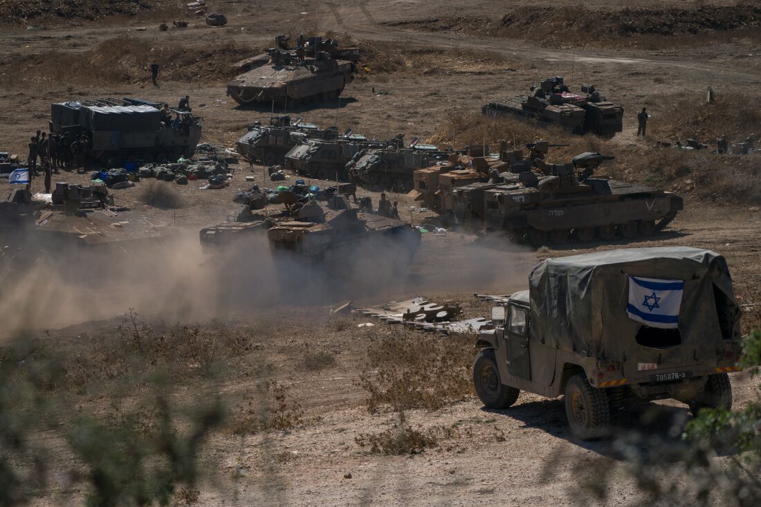 Tanks and troops gather in northern Israel on Monday in preparation for a ground invasion.