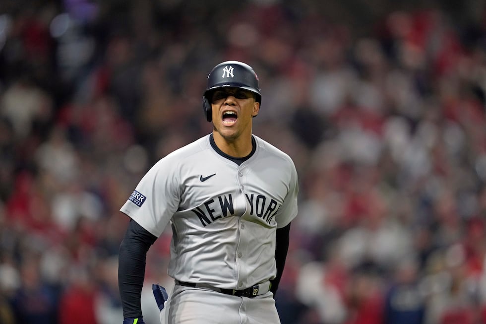 New York Yankees' Juan Soto celebrates after hitting a three-run home run against the...