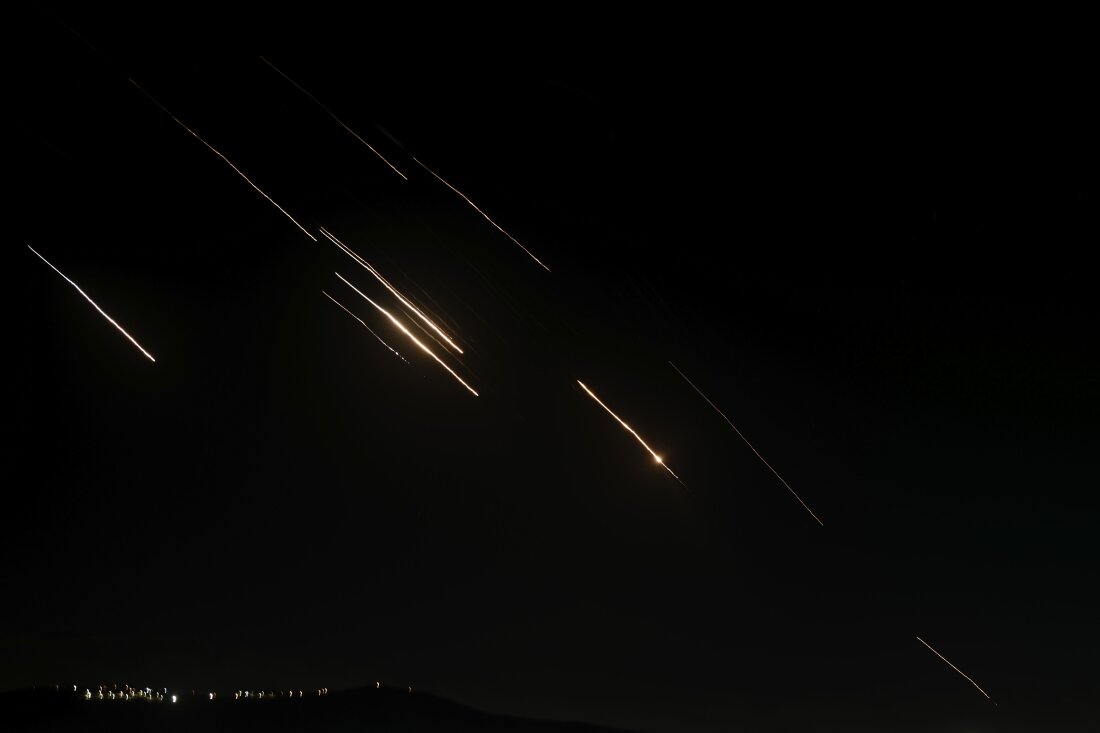 Missiles launched from Iran towards Israel are seen in the West Bank city of Nablus Tuesday, Oct. 1, 2024.