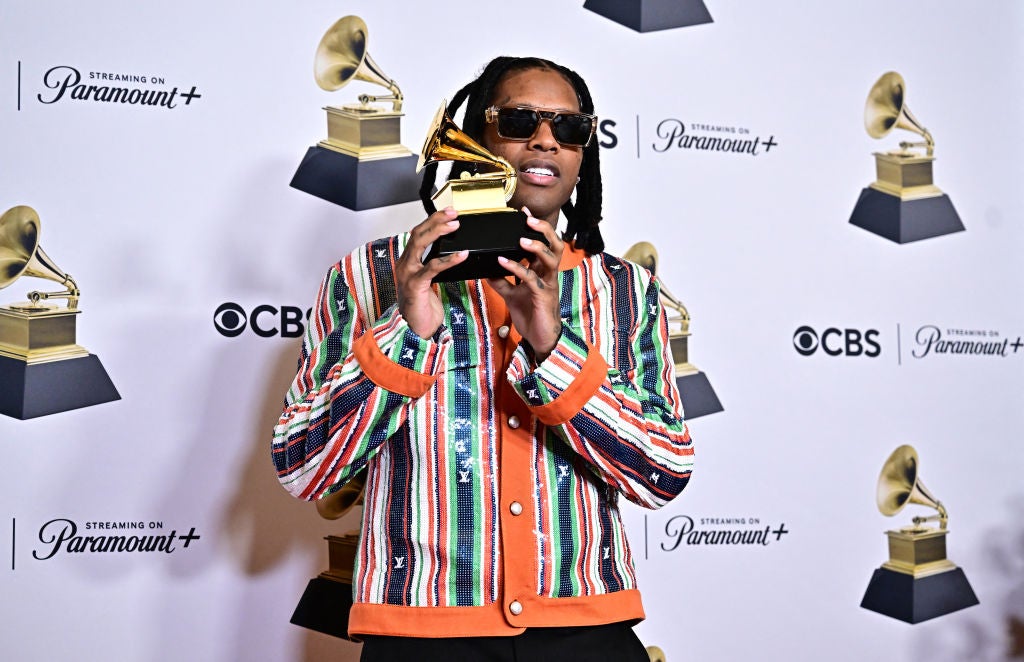 Lil Durk poses in the press room with the Grammy for Best Melodic Rap Performance for 