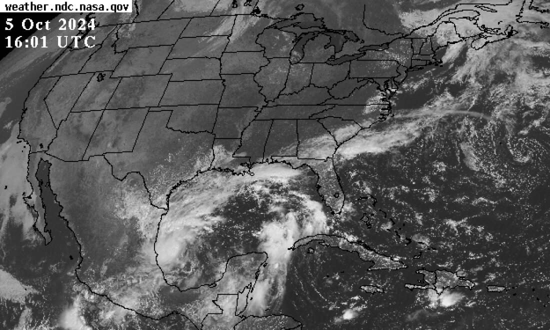 Weather satellite image of the United States taken on Saturday afternoon ET. Courtesy of the NASA George C. Marshall Space Flight Center Earth Science Branch in Huntsville, Ala.