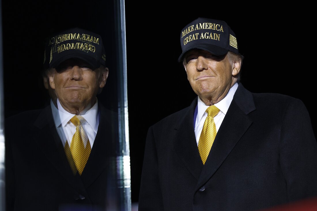 Republican presidential nominee, former President Donald Trump arrives for a campaign rally at in Traverse City, Mich., on Friday. 