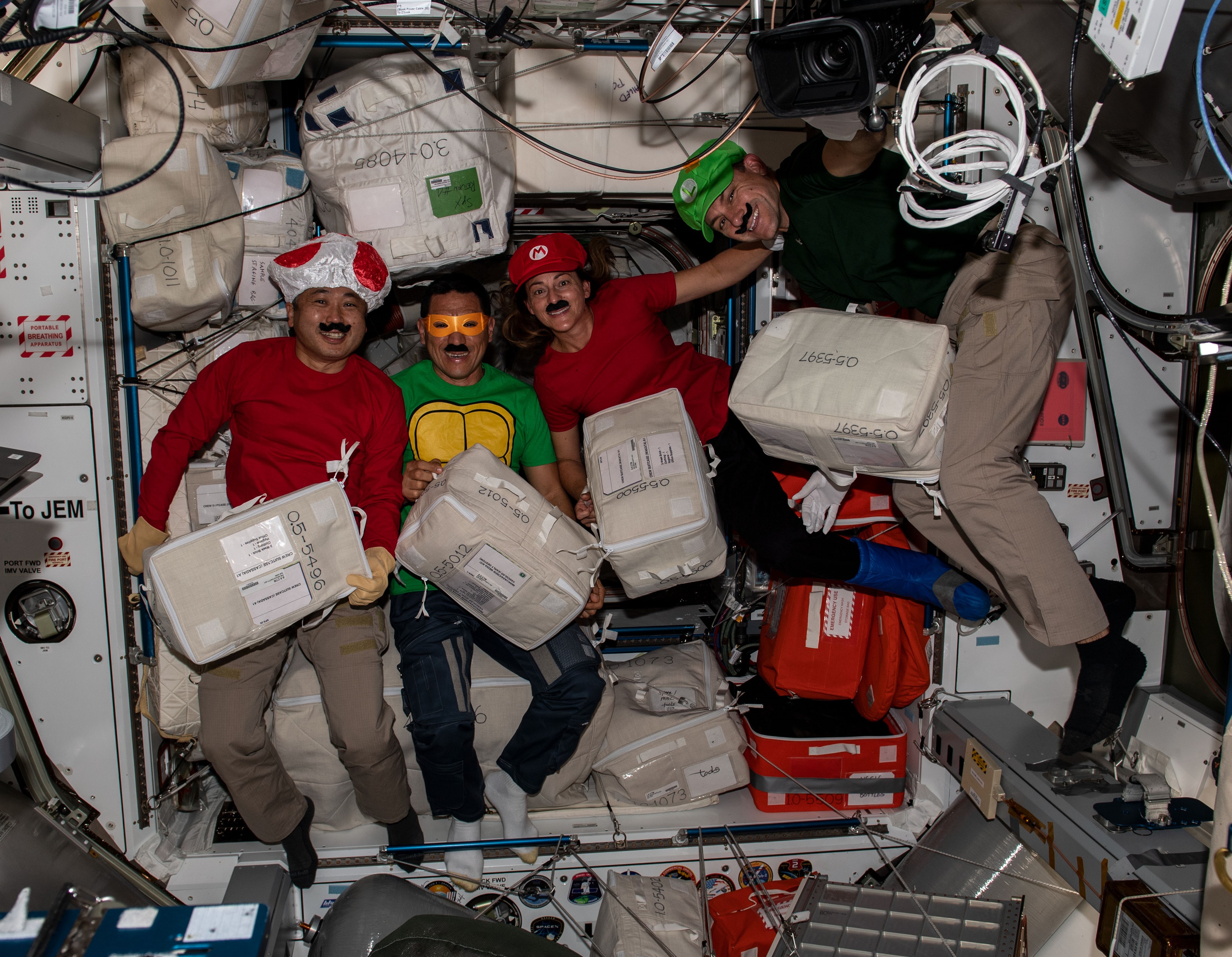 Expedition 68 dressed as popular video game and cartoon characters