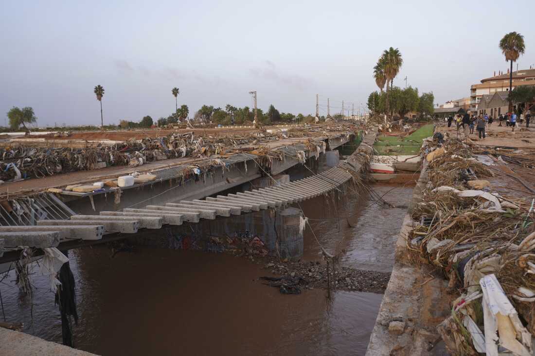 Train tracks are seen affected by floods in Paiporta, near Valencia, Spain on Wednesday.